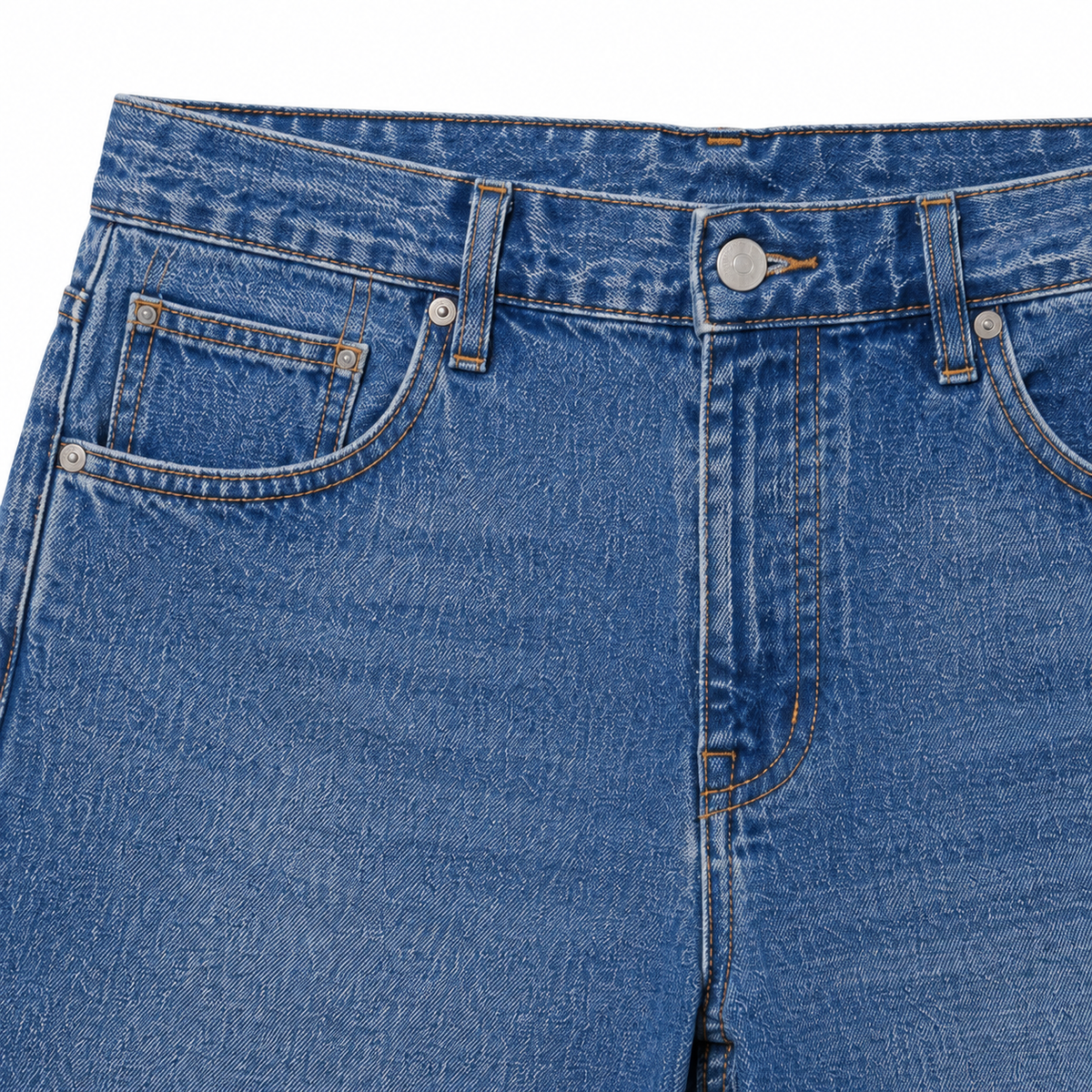 A close-up of a blue denim short, showing stitched details, and fabric texture against a white background.
