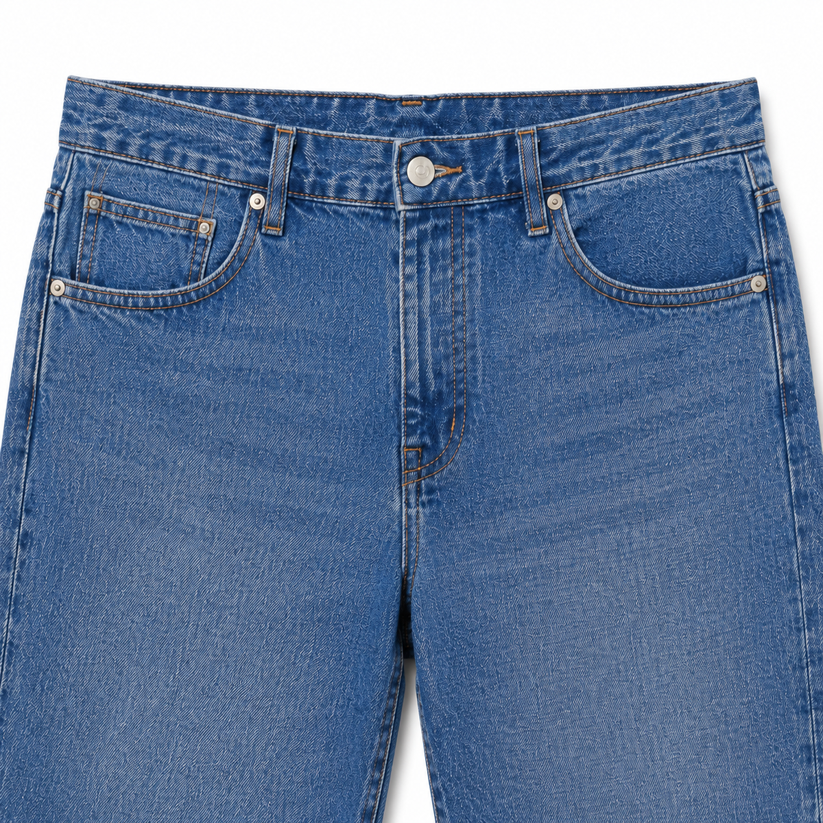 Close-up of a pair of blue denim jeans showing the front waistband, belt loops, button, and front pockets on a white background.
